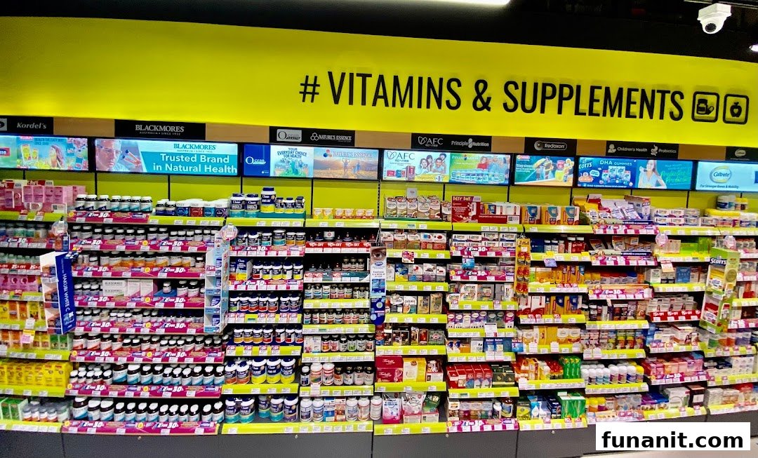 A well-stocked aisle featuring a wide array of vitamins and supplements at Watsons/GNC.