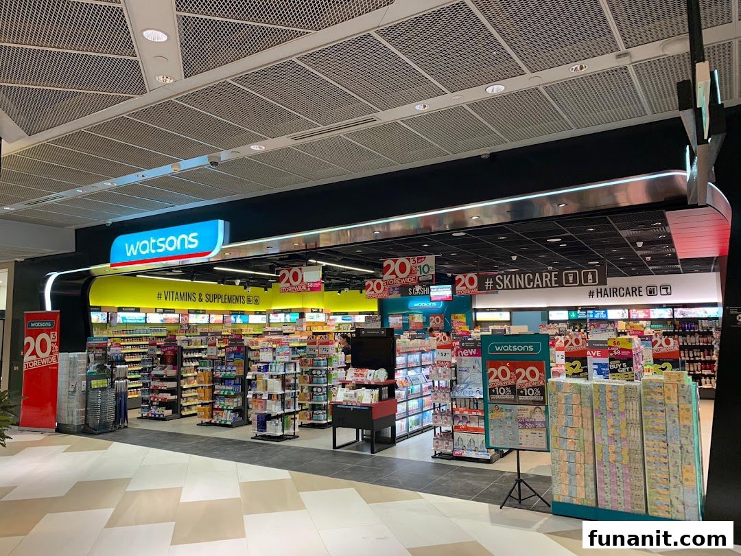 The brightly lit entrance of a Watsons store, showcasing health, beauty, and wellness products.