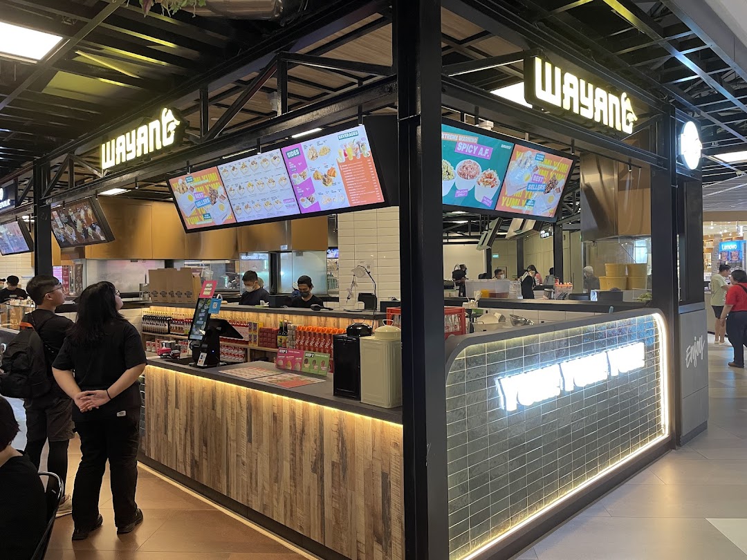 A bustling Wayang food stall in Funan mall, featuring digital menus and a service counter.