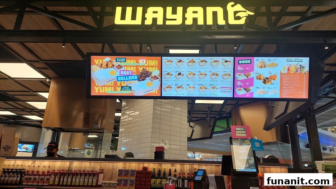 Digital menu boards display a variety of Indonesian-inspired dishes, sides, and beverages at Wayang Funan.