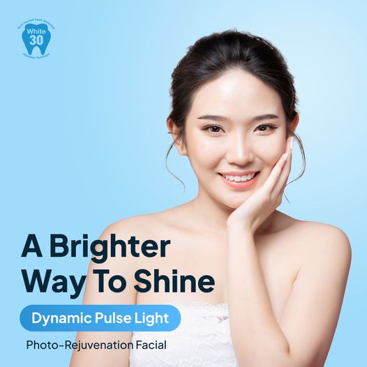 A smiling woman promoting White30's Dynamic Pulse Light Photo-Rejuvenation Facial on a blue background.