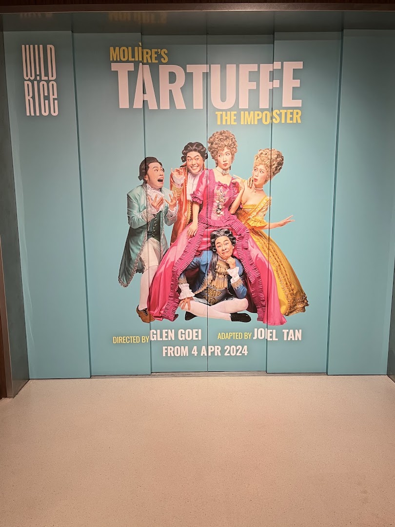A large promotional poster for Wild Rice's production of Molière's Tartuffe: The Imposter.