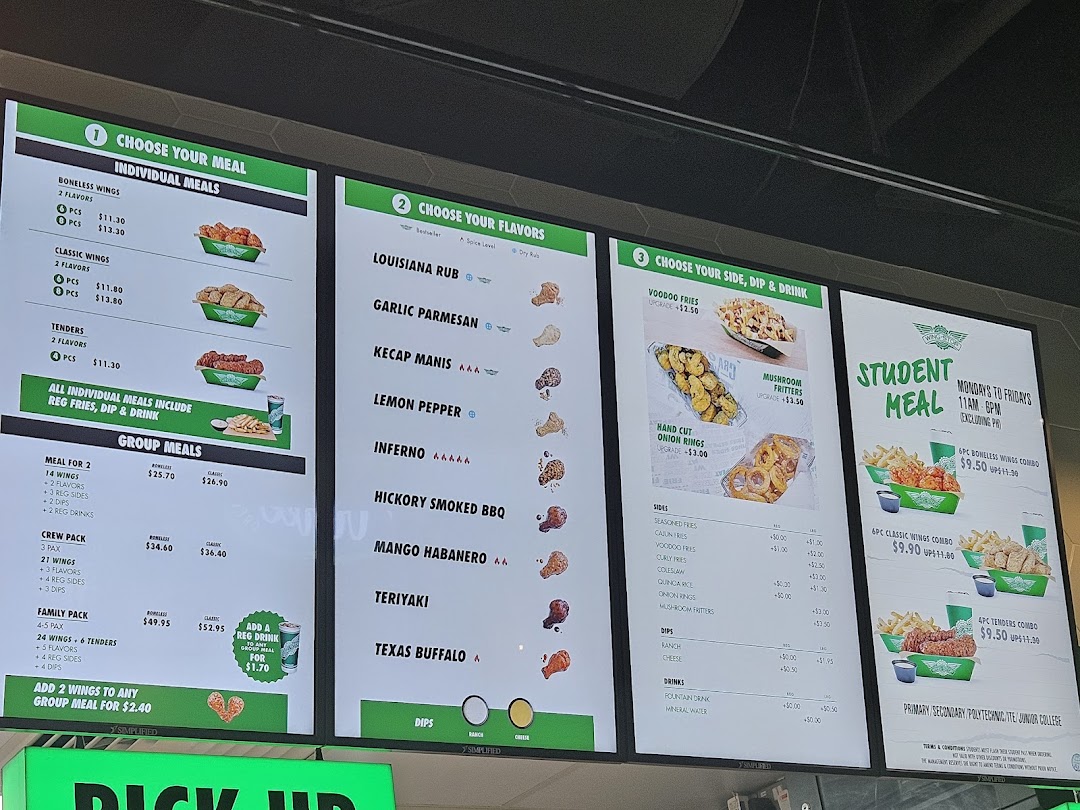 A digital menu board displaying Wingstop's meal options, flavors, sides, and student deals.
