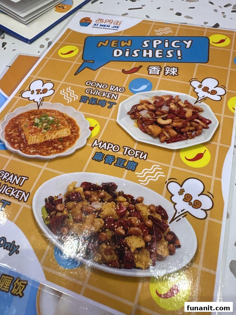 A menu page from Xi Men Jie featuring new spicy dishes with prices and photos.