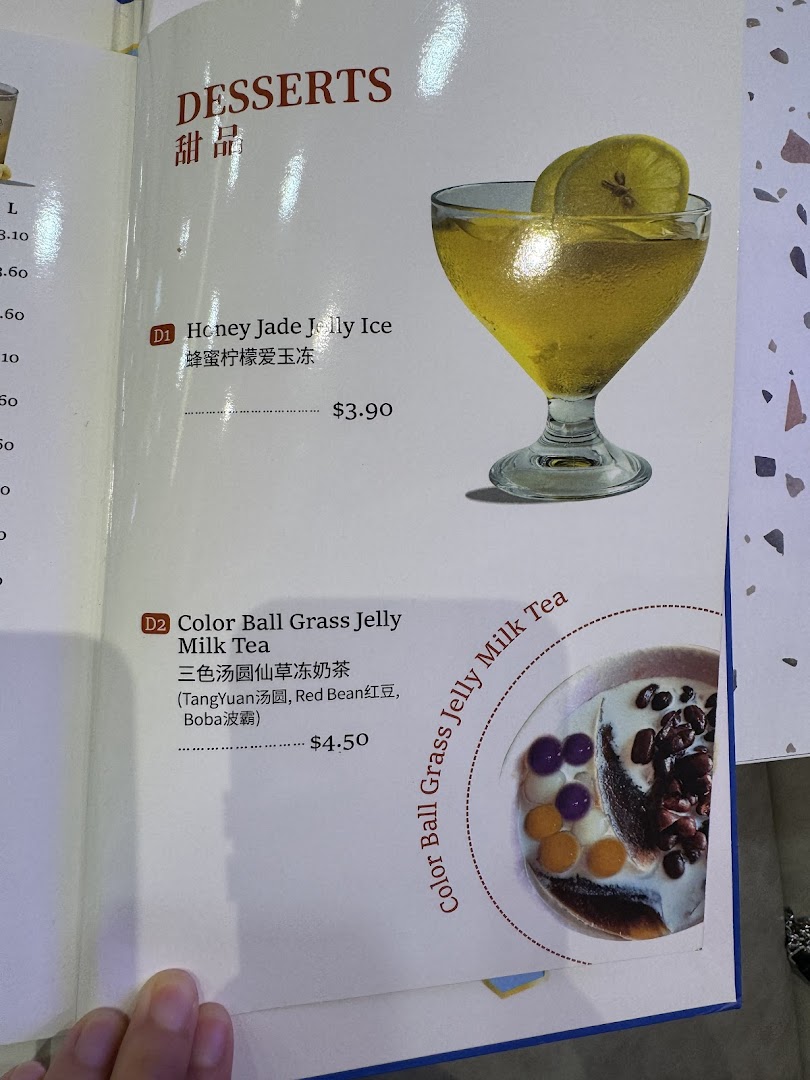 A menu page showcasing delicious Taiwanese desserts, including Honey Jade Jelly Ice and Color Ball Grass Jelly Milk Tea.
