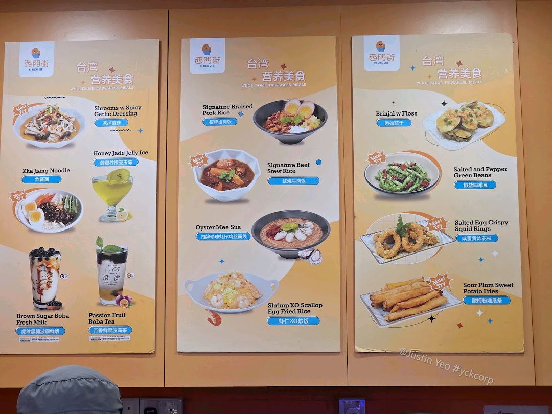 A vibrant display of menu boards showcasing various Taiwanese dishes and beverages.