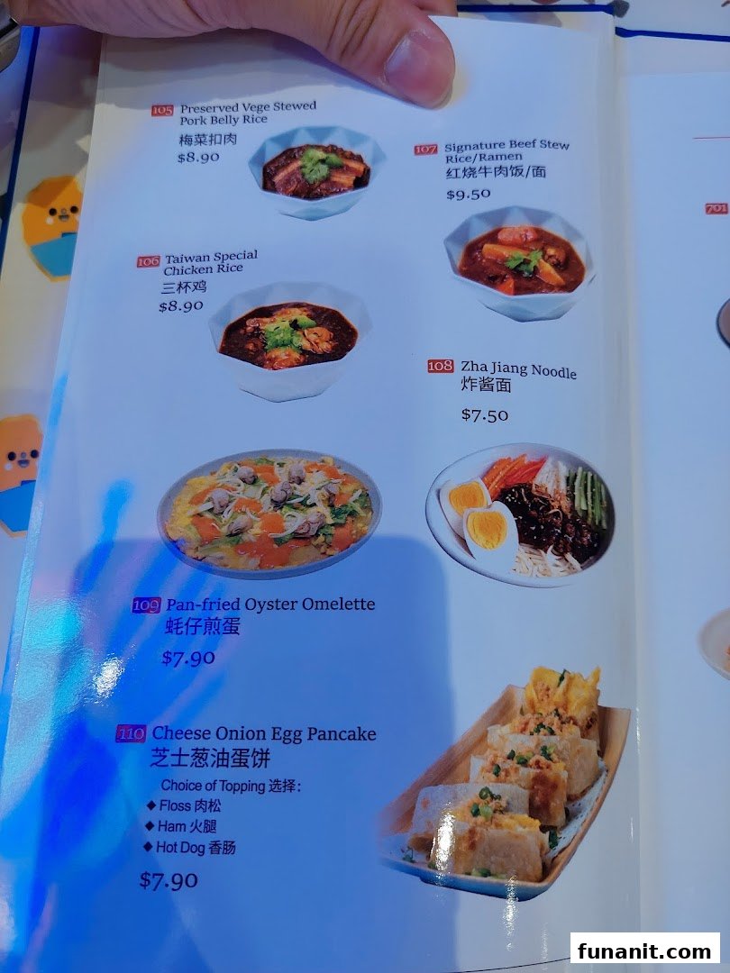 A page from Xi Men Jie's menu showcasing various Taiwanese dishes with prices and images.