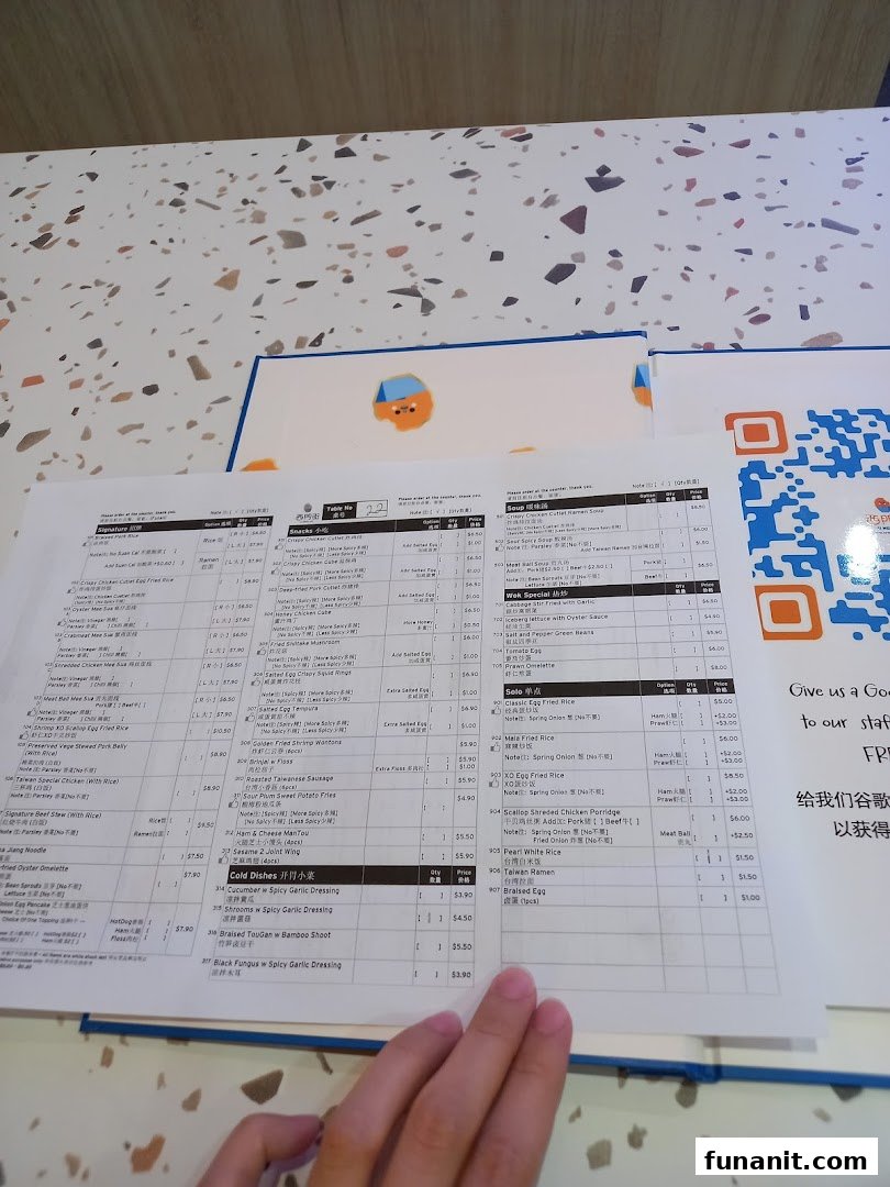 A detailed menu from Xi Men Jie Taiwanese restaurant, displaying various dishes and prices.