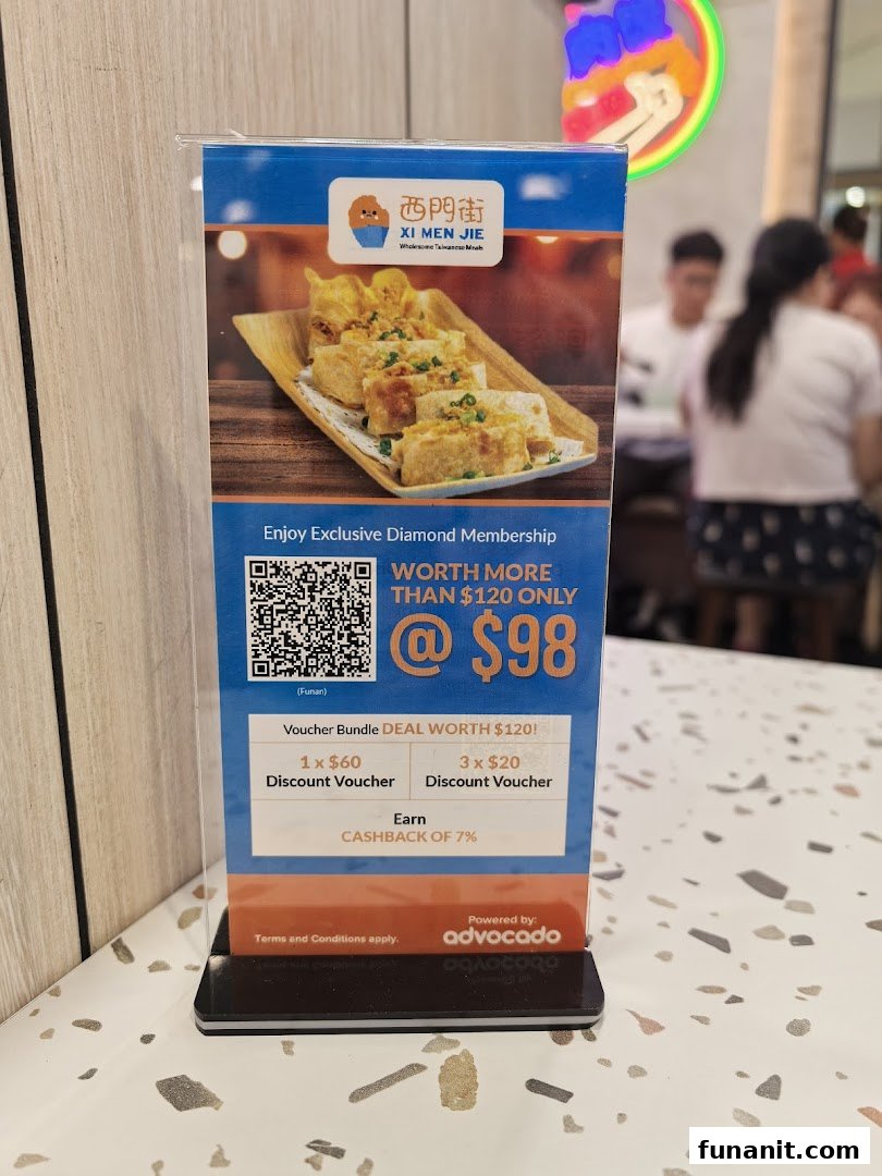 A table tent display at Xi Men Jie advertising an exclusive Diamond Membership offer with discount vouchers.