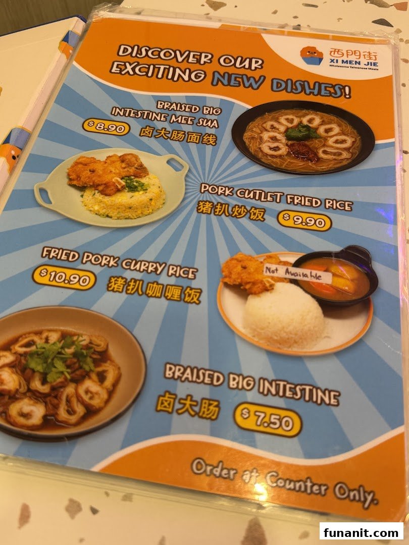 A menu page from Xi Men Jie showcasing new Taiwanese dishes with prices and images.
