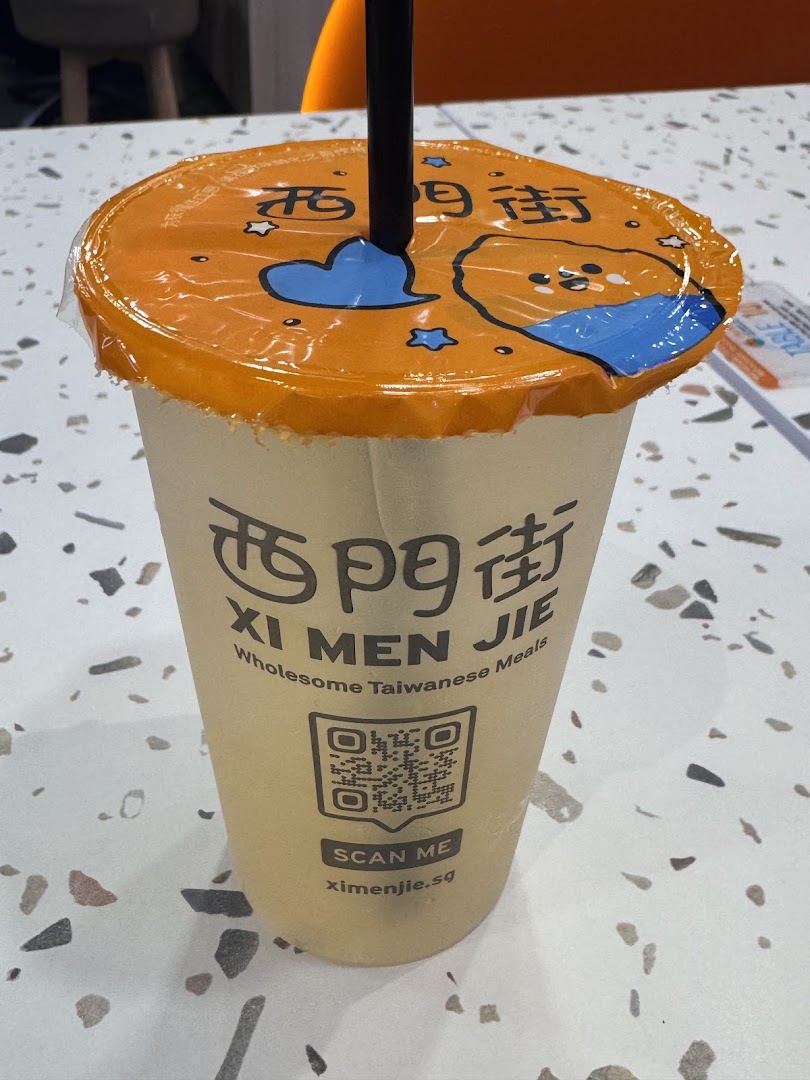 A refreshing Taiwanese drink cup from Xi Men Jie, featuring the brand's logo and a QR code.