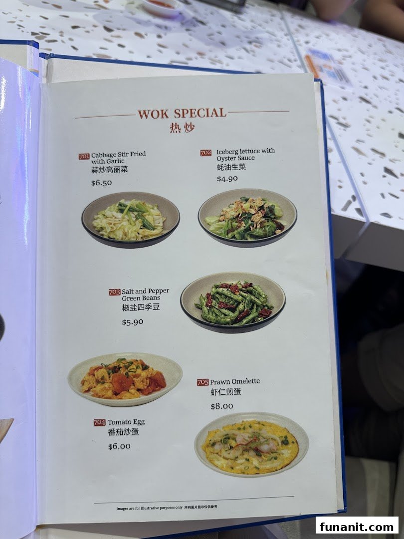 A menu page from Xi Men Jie featuring 'Wok Special' dishes with prices and images.
