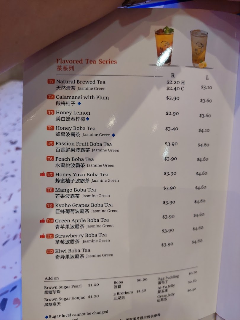 A detailed menu displaying a variety of flavored tea series and add-ons with prices.
