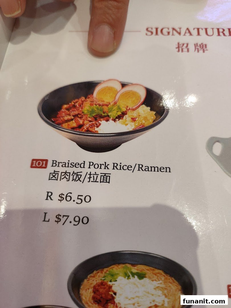 A menu page showcasing the shop's signature Braised Pork Rice/Ramen with pricing options.