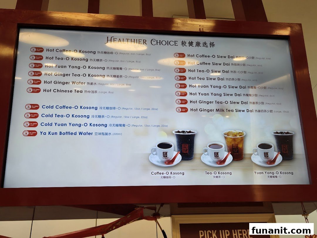 A digital menu board displaying 'Healthier Choice' hot and cold beverages with no added sugar or less sugar options.