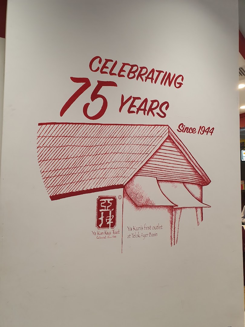 A wall mural celebrating Ya Kun Kaya Toast's 75th anniversary, featuring an illustration of its first outlet.