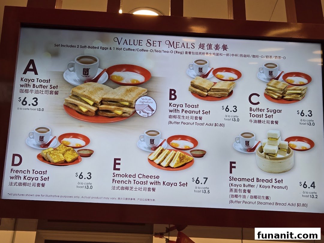 A digital menu board displaying various value set meals with toast, eggs, and drinks at Ya Kun Kaya Toast.