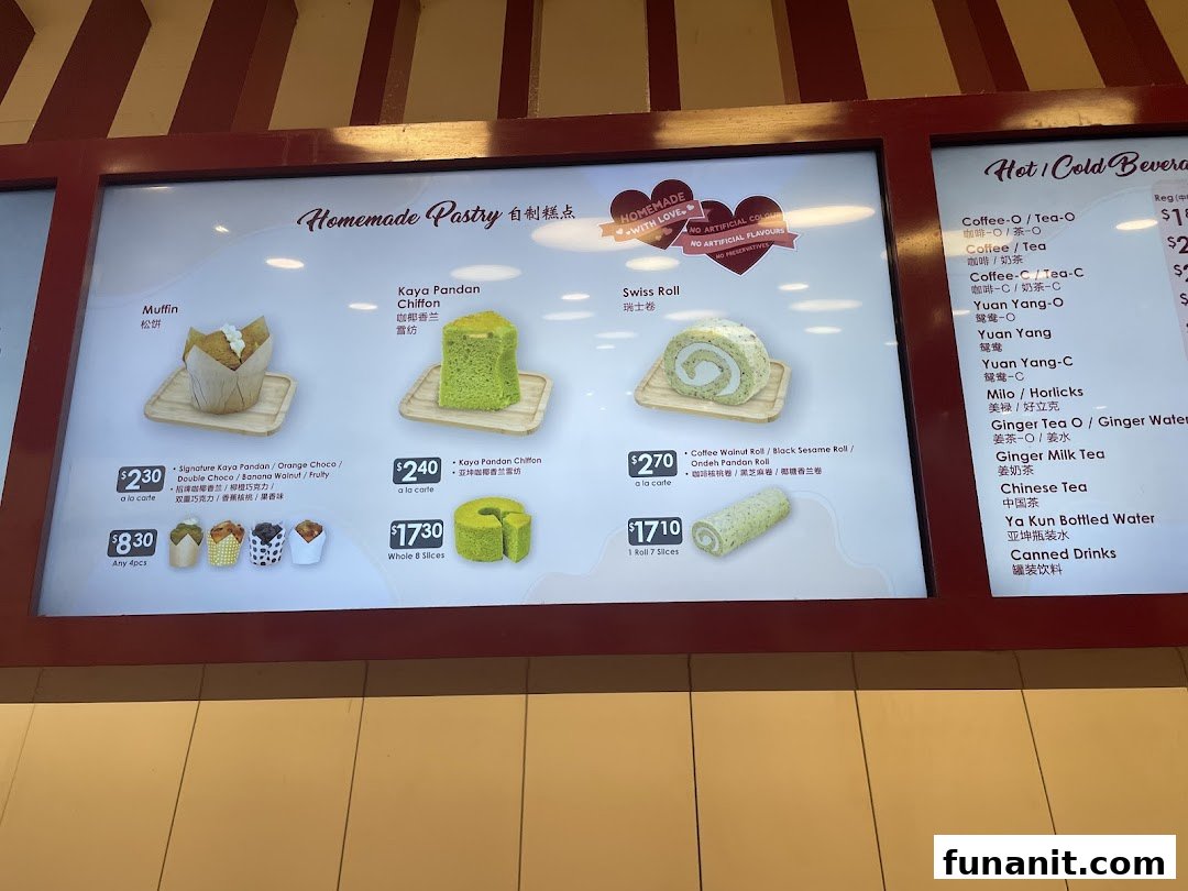 A detailed menu board showcasing Ya Kun Kaya Toast's homemade pastries and beverage selections.