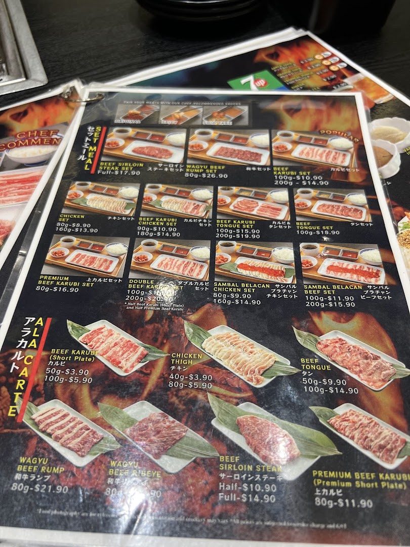 A detailed menu from Yakiniku Shokudo showcasing various yakiniku sets and à la carte meat options.