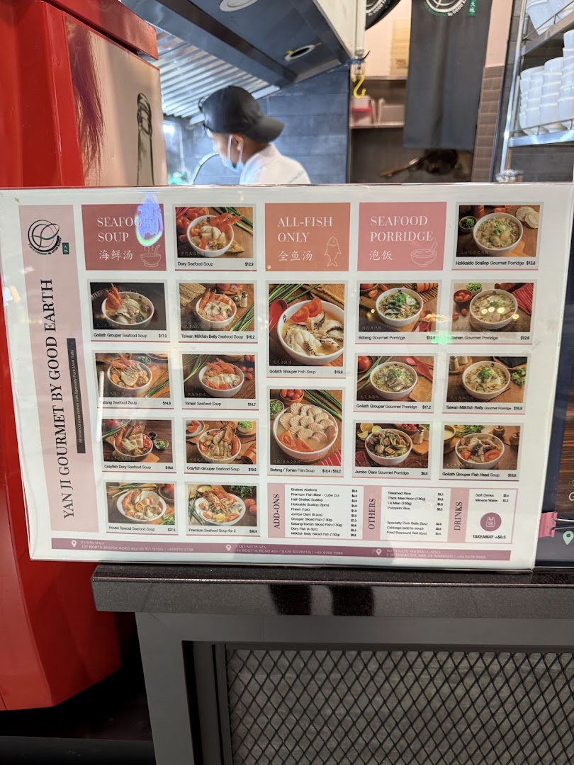 A detailed menu board for Yan Ji Gourmet Seafood Soup, showcasing various seafood and fish soup options with prices.