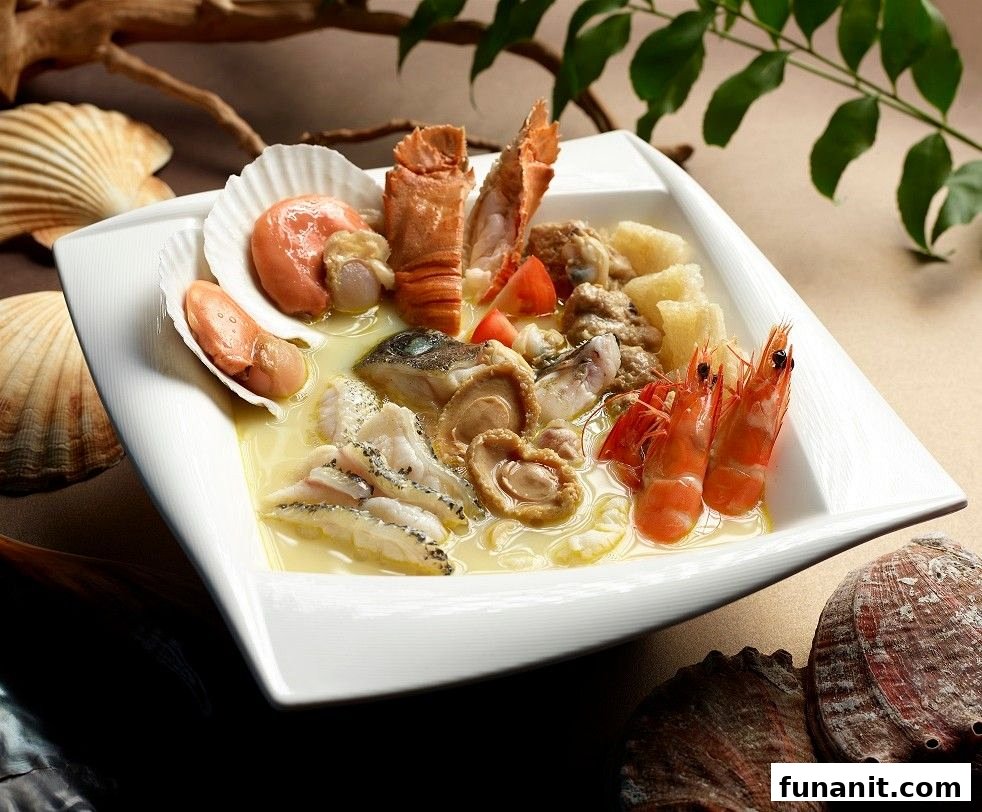 A rich seafood soup featuring prawns, scallops, abalone, fish, and lobster in a creamy broth.