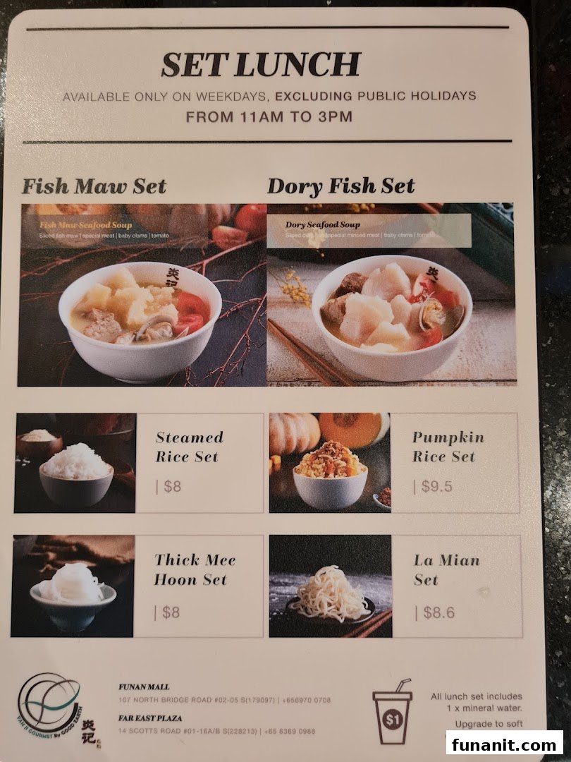 A detailed menu displaying set lunch options, including seafood soups and various rice/noodle sets.