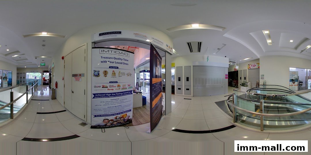 The Imtidad Jurong IMM Branch shop entrance with promotional banners and awards displayed.