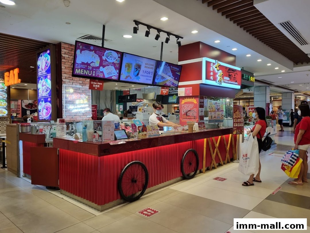 A Shihlin Taiwan Street Snacks stall with staff serving customers and a menu displayed.