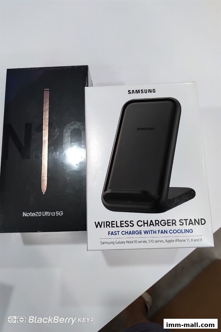 Samsung Note20 Ultra 5G phone and a Samsung wireless charger stand.