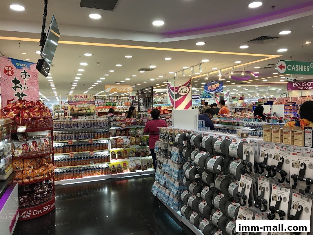 Interior view of a brightly lit Daiso store with shelves stocked with food, household items, and accessories.