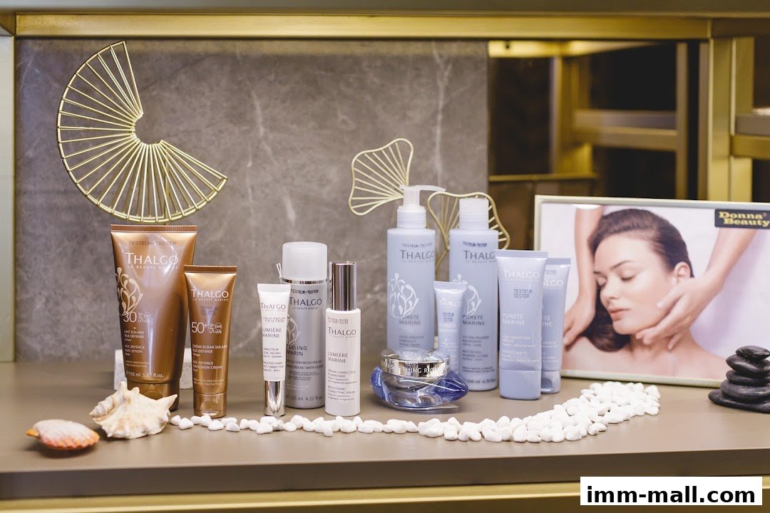A display of Thalgo skincare products with decorative elements and a promotional image.