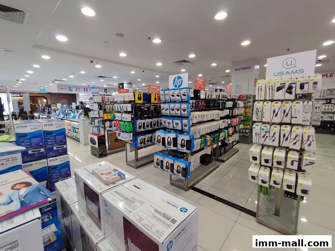 Interior view of a well-stocked electronics store with various gadgets and accessories on display.