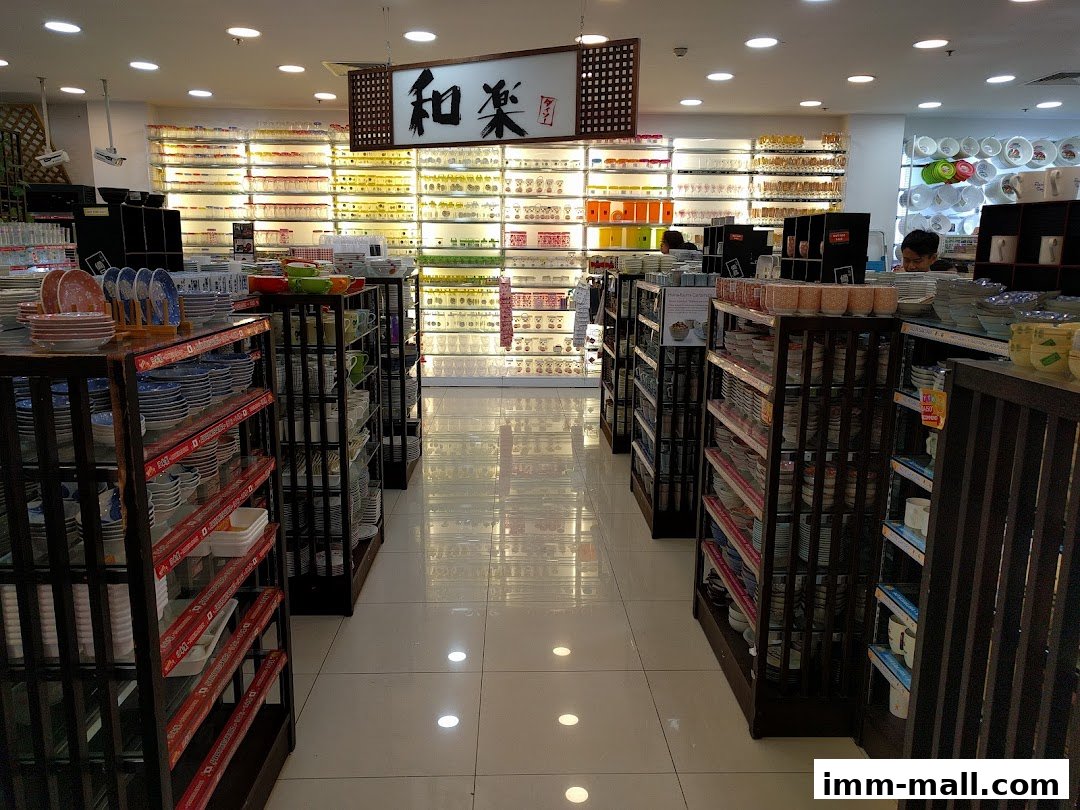 Interior view of a well-lit retail store showcasing shelves filled with various homeware and kitchenware items.