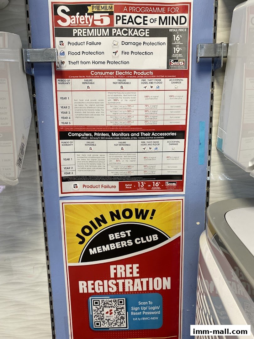 A sign detailing warranty programs for electronics and a promotion for a members club.
