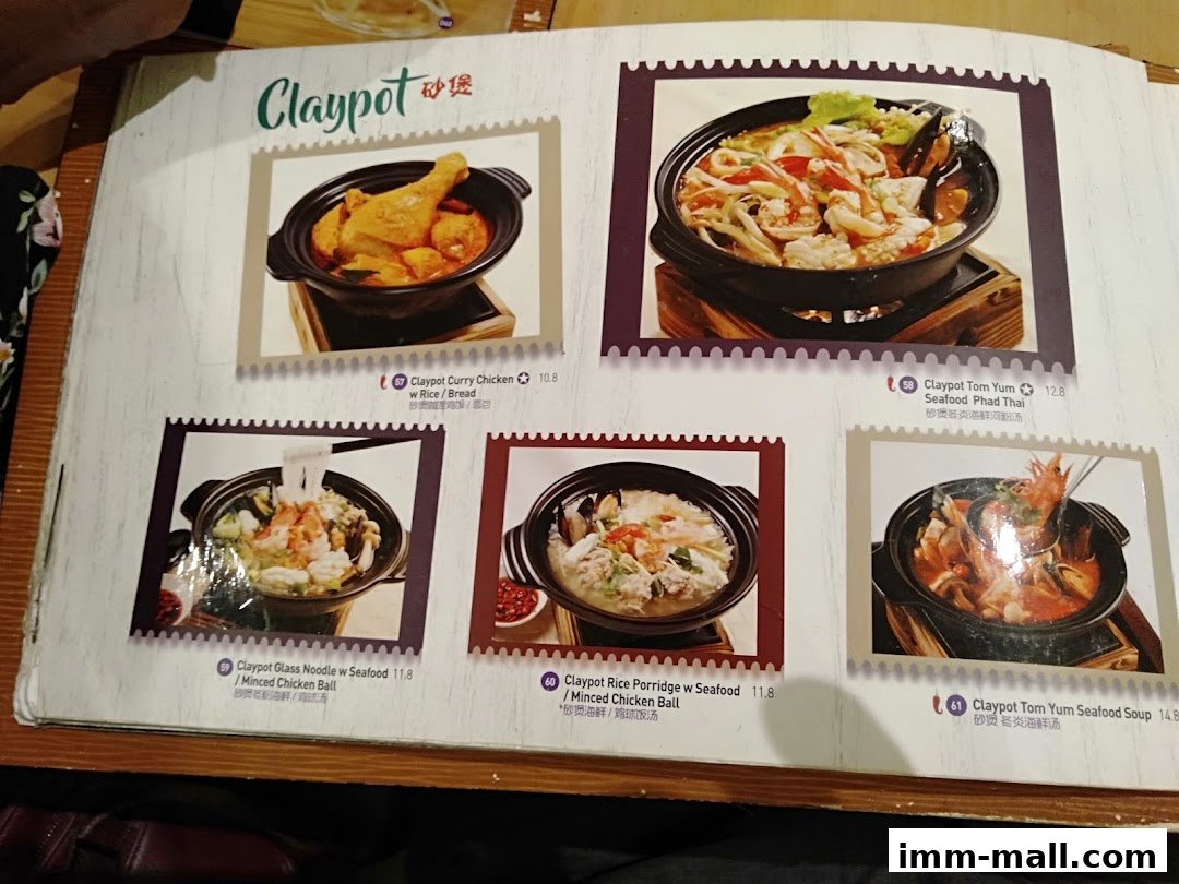 A menu page showcasing various claypot dishes with appetizing food photography.