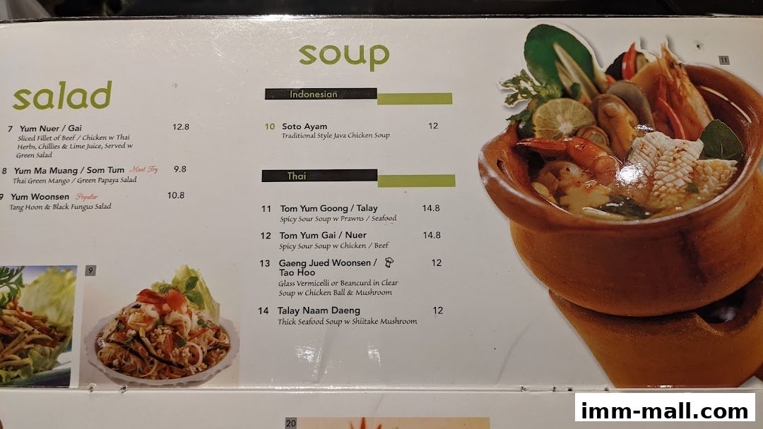 A menu featuring Thai and Indonesian soups and salads with prices and descriptions.