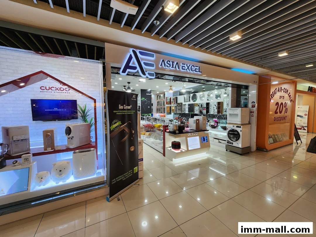 Asia Excel Pte. Ltd. shop front displaying various home appliances and a promotional sign.