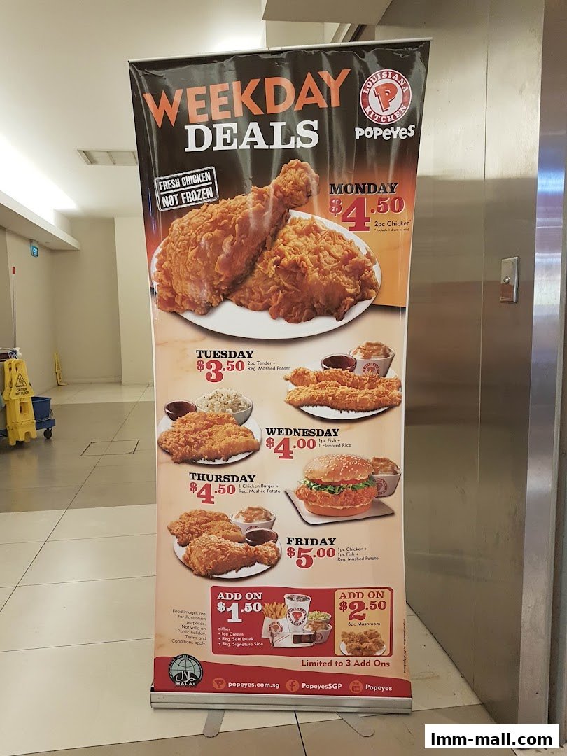 A Popeyes Weekday Deals banner showcasing daily specials and add-on offers.