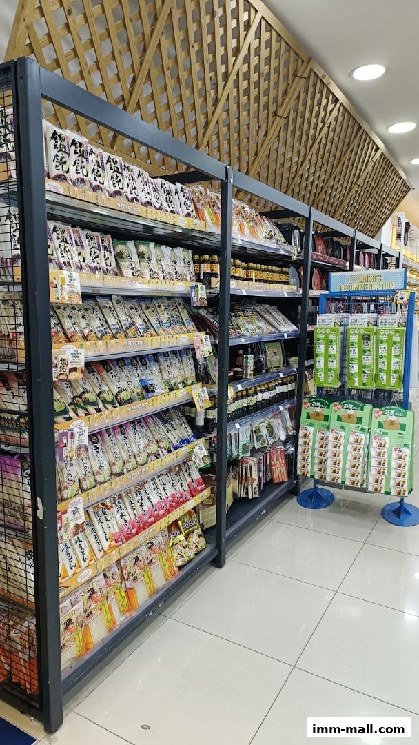 Shelves stocked with various Japanese food products, including noodles and seasonings.