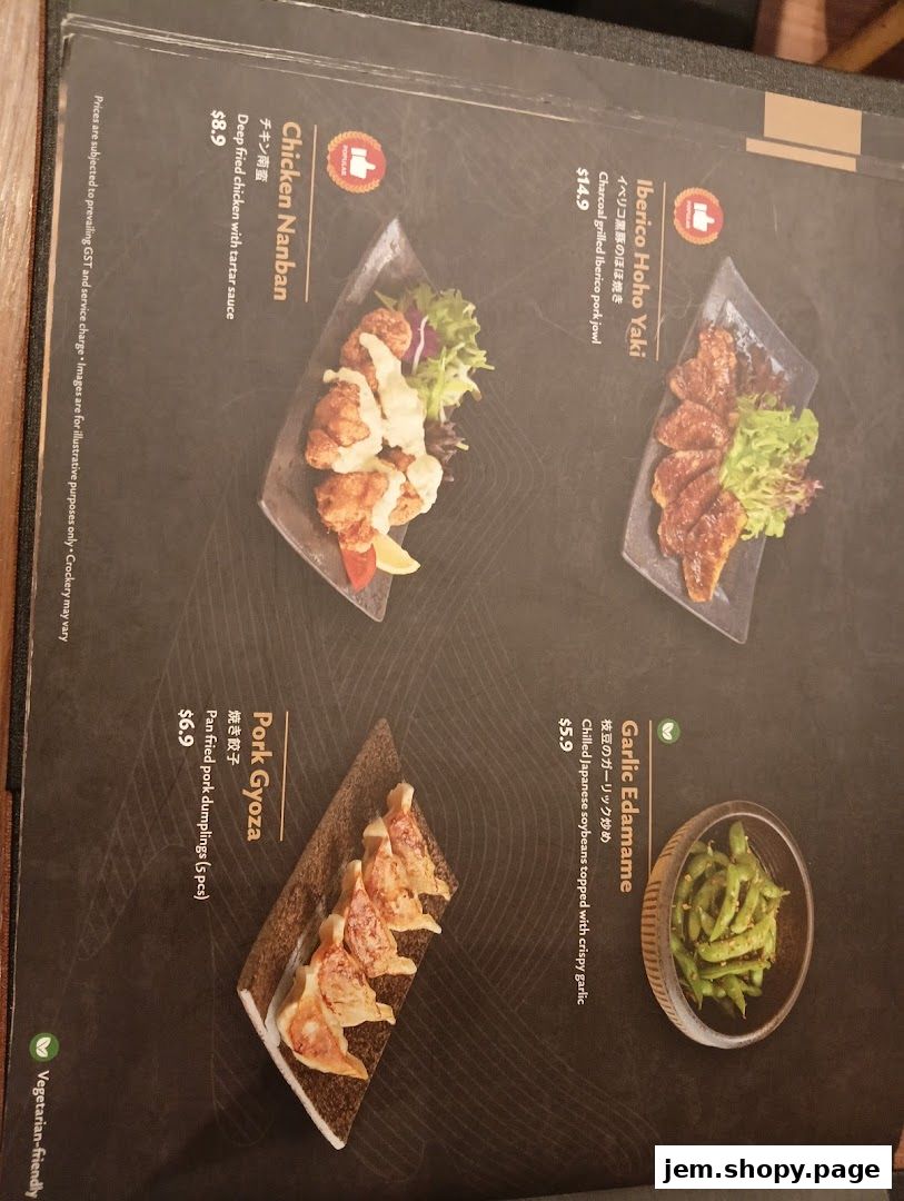 A menu page from Aburi-EN Jem featuring Japanese dishes like Iberico Hoho Yaki and Chicken Nanban.
