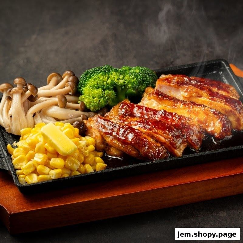 A sizzling hot plate of grilled chicken with corn, broccoli, and mushrooms.