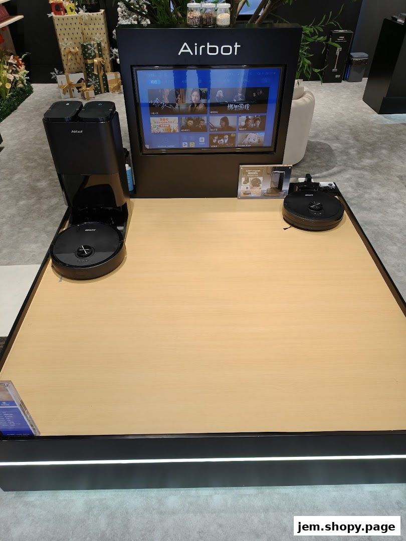 Airbot robotic vacuum cleaners and docking stations displayed in a retail store.