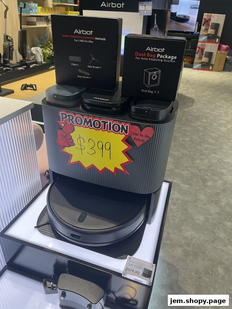 Airbot robot vacuum cleaner and accessories on display with a promotion sign.