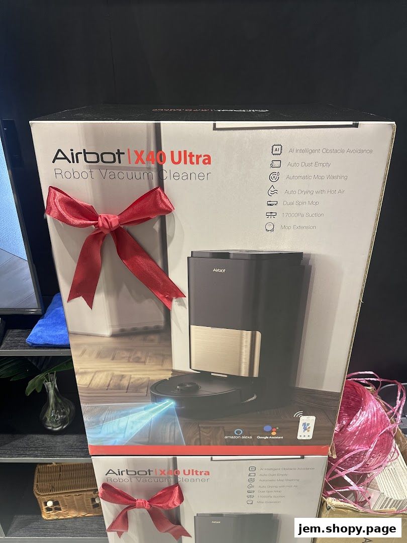 Box of Airbot X40 Ultra Robot Vacuum Cleaner with red ribbon.