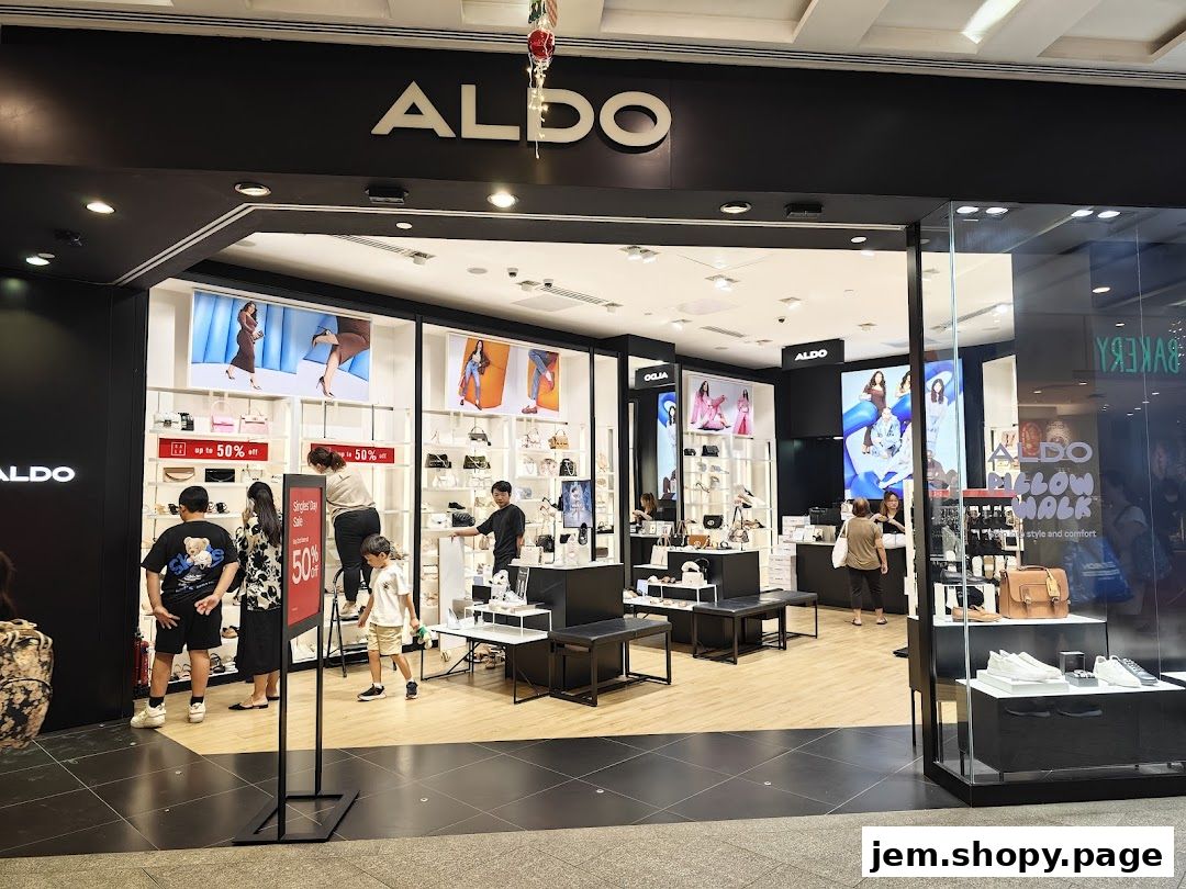 The entrance of an ALDO shoe and handbag store with displays and shoppers.