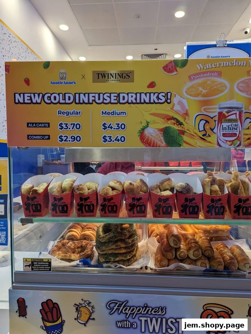 Auntie Anne's shop display featuring new cold infuse drinks and various pretzel products.