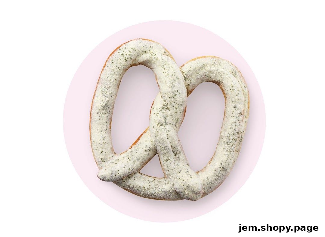A close-up of a freshly baked pretzel dusted with a savory seasoning.