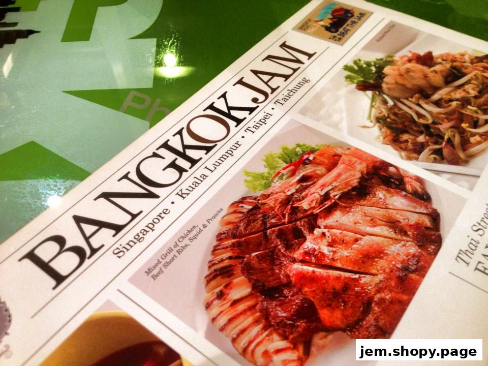 A menu from Bangkok Jam featuring images of grilled meats and Pad Thai.