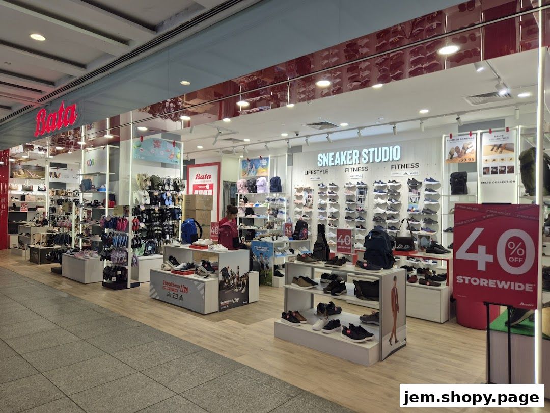 The Bata JEM shoe store displays a wide variety of footwear, including sneakers and sandals, with a prominent 40% off sale.