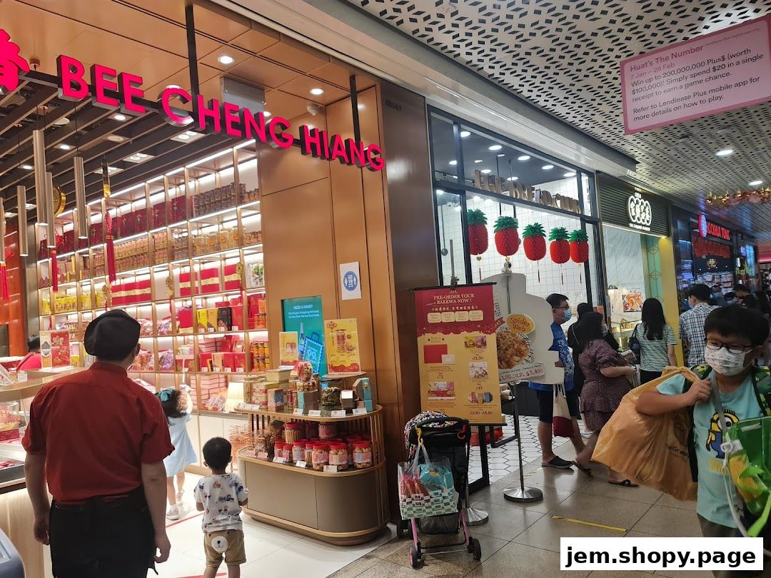 Bee Cheng Hiang shop front displaying baklava and other treats, with customers browsing.